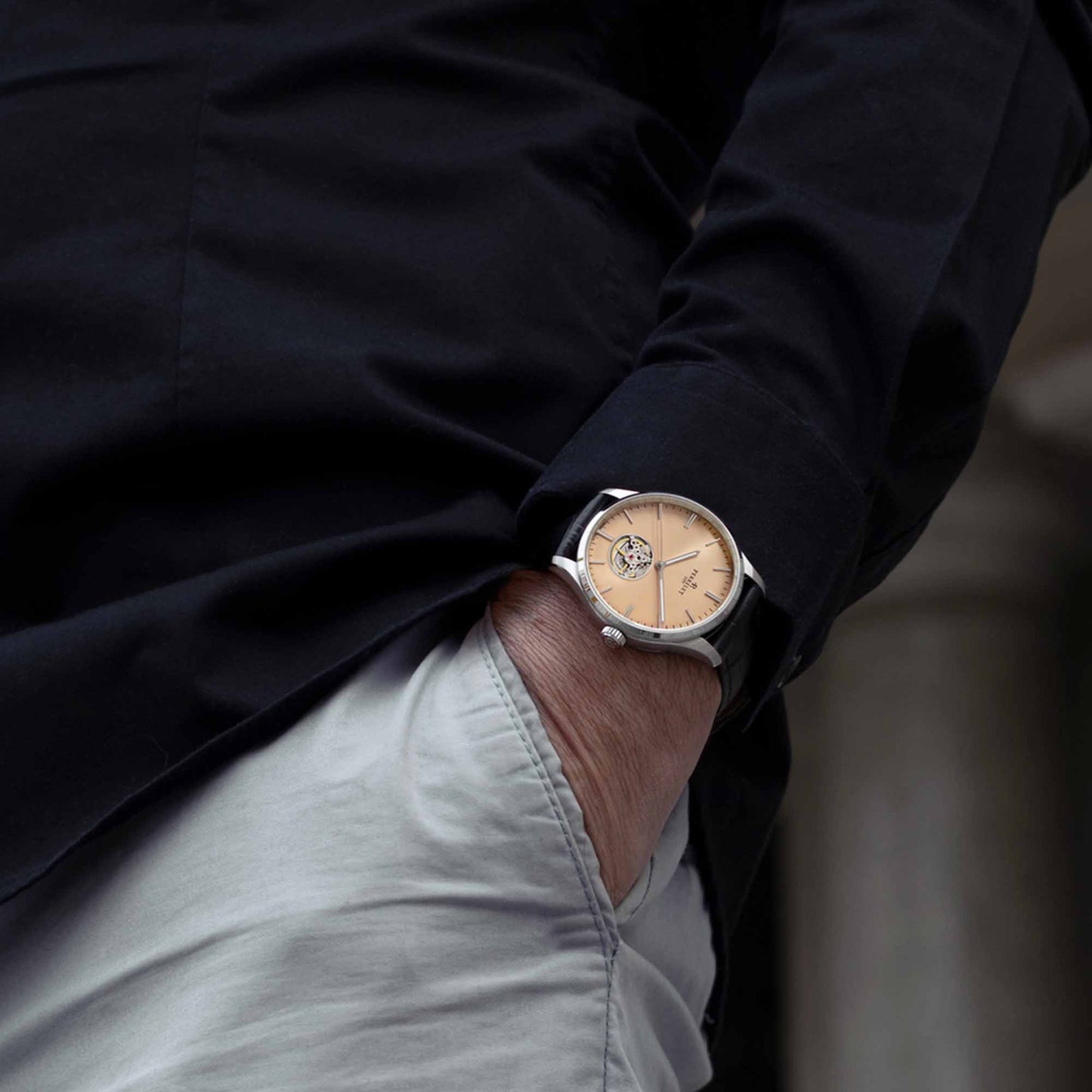 WEEKEND Open Heart A1302/E showcases a soft salmon dial and visible mechanics in a sleek, contemporary case.