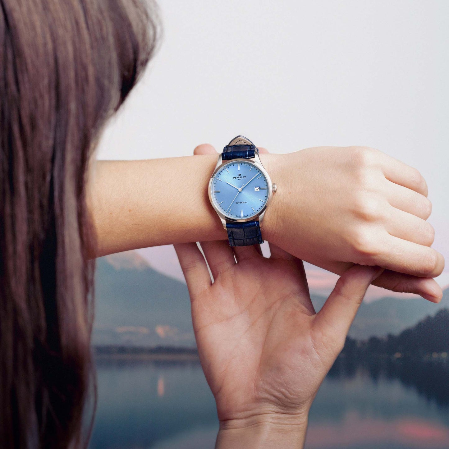 WEEKEND A1300/C by Perrelet features a refined ice blue dial and sleek stainless steel case for modern collectors.
