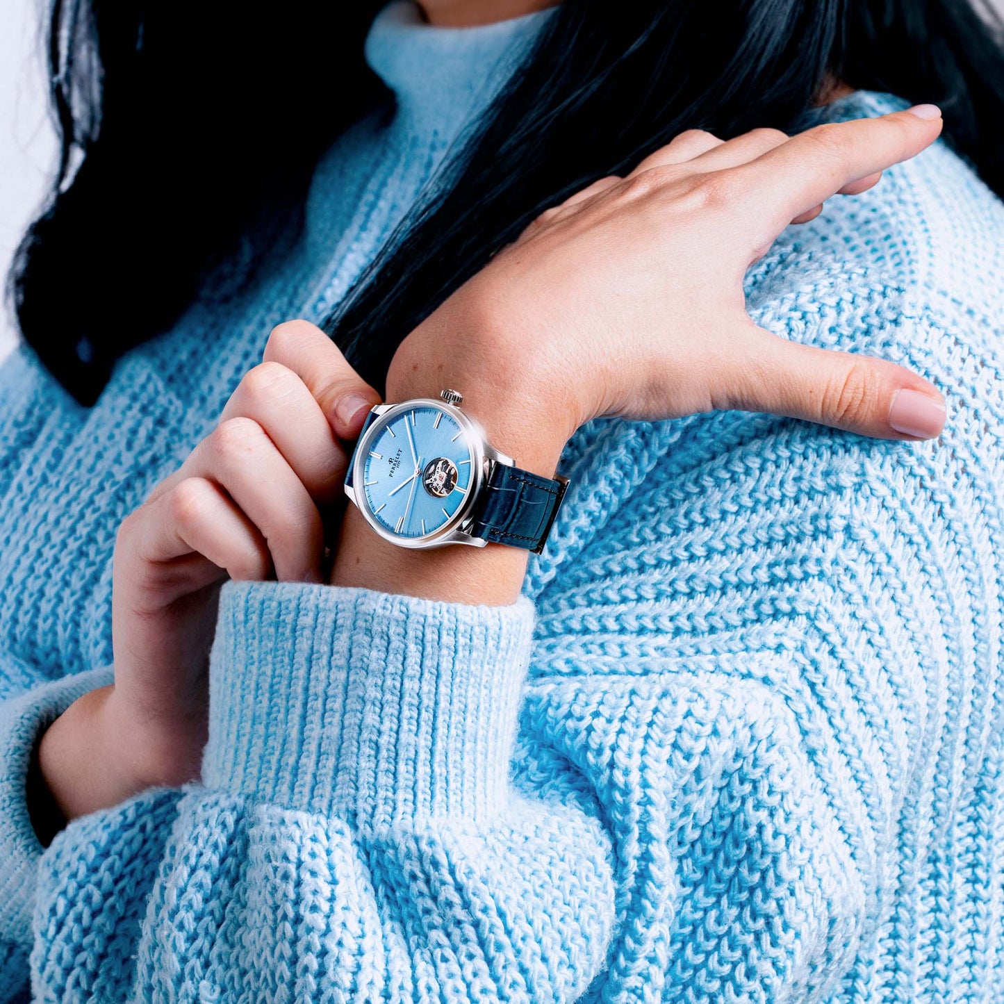 WEEKEND Open Heart A1302/A blends classic style with an ice blue dial and exposed movement for refined wrist presence.