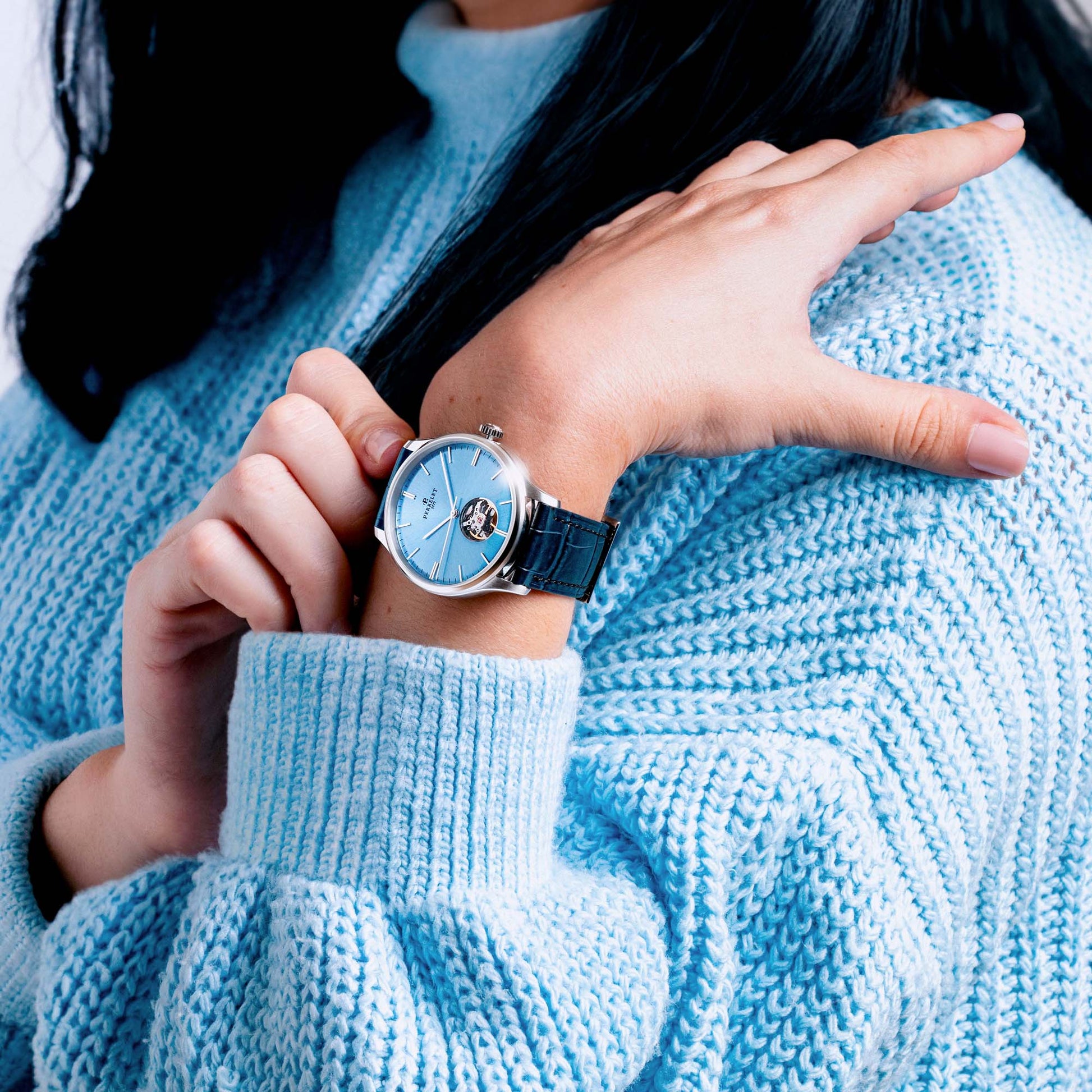 WEEKEND Open Heart A1302/A blends classic style with an ice blue dial and exposed movement for refined wrist presence.